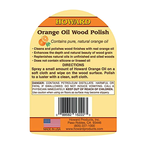Label for handcrafted orange oil wood polish made in USA, highlighting natural orange oil for cleaning, conditioning, and enhancing wood surfaces, suitable for home and decor use.