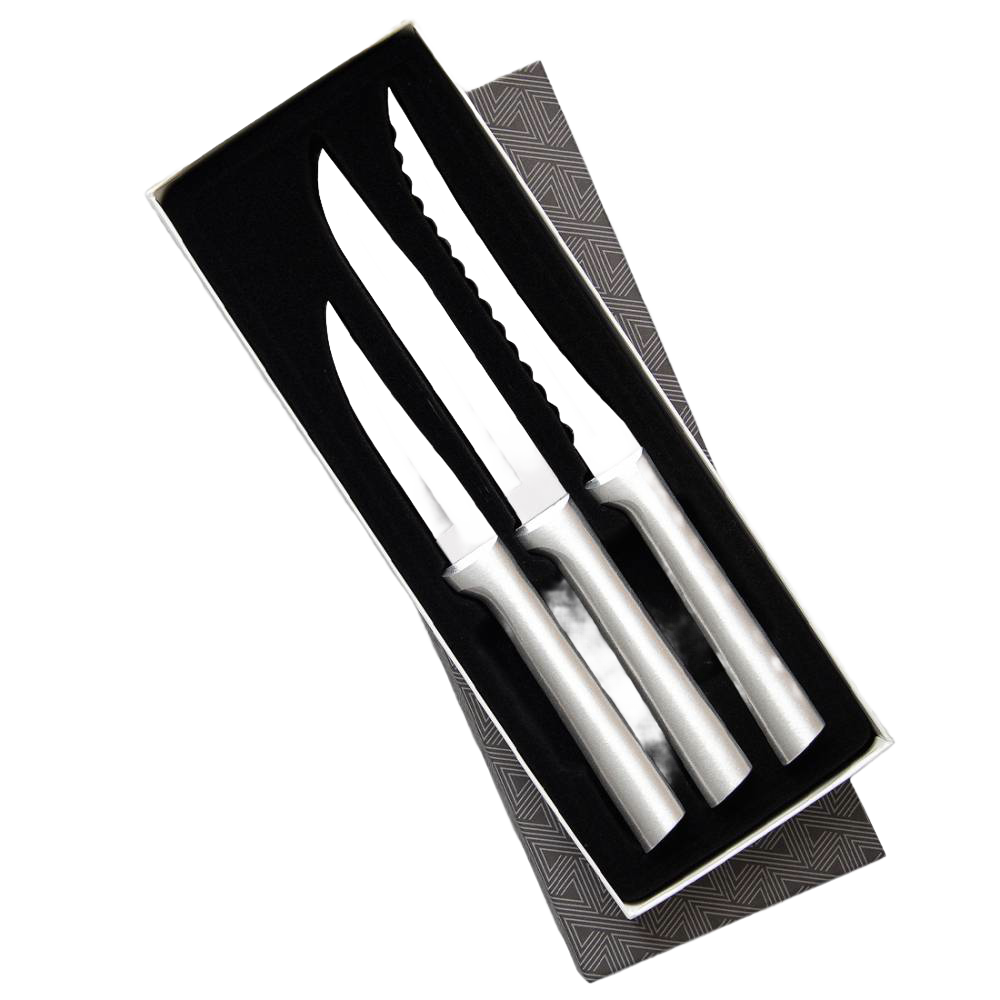 Set of three handcrafted steel knives with textured blades and smooth silver handles, neatly arranged in a black foam-lined gift box, ideal for kitchen food prep and USA made collections.