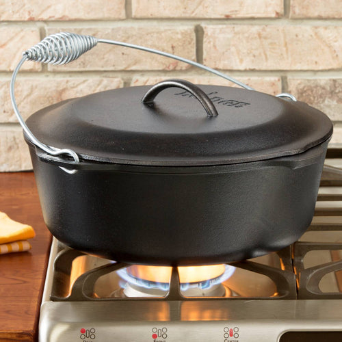 Black cast iron Dutch oven with spiral bail handle and tight-fitting lid, pre-seasoned and ready for use, featured in Kitchen & Food, Cookware, Cast Iron, USA Made, Best Sellers, and Promo Eligible collections.
