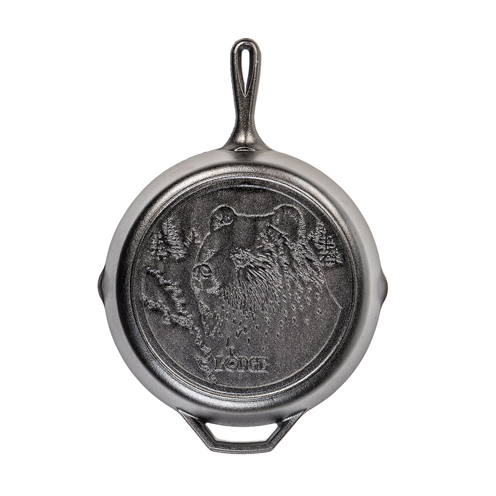 Cast iron skillet featuring a detailed bear design, crafted for durable use in kitchen and outdoor cooking, part of USA Made Cookware and Cast Iron collections.