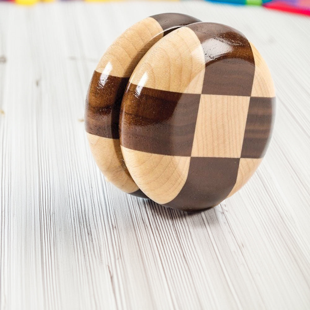 Handcrafted wooden yo-yo with alternating maple and walnut squares, smooth gleaming finish, Amish made in USA, perfect for indoor play, part of Toys, Books & Games and Wooden Toys collections.
