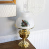 Handcrafted white glass lamp shade featuring a soaring eagle design over pine trees paired with a polished brass oil lamp base, ideal for Lamps & Lighting and Parts and Accessories collections.