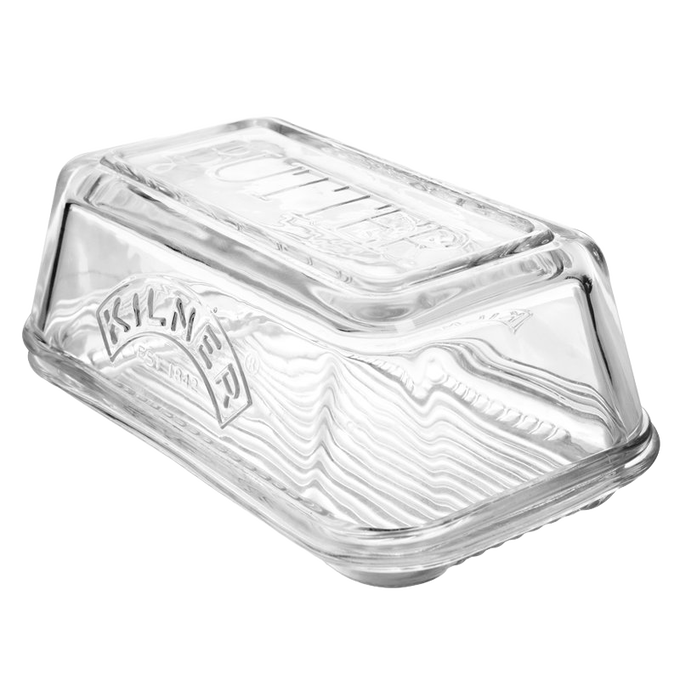 Transparent glass butter dish embossed with "Butter" on the lid and the Kilner® logo on the side, designed for fresh butter storage and serving in Kitchen & Food and Specialty Equipment collections.