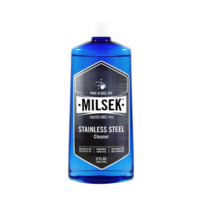 Blue bottle of stainless steel cleaner with black and white label indicating trusted USA-made formula, designed for home, household cleaning, and polish applications.