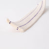 Close-up of a durable cotton lamp wick with two parallel purple stitching lines, designed for French oil lamps, featured in Lamps & Lighting, Parts and Accessories, Wicks and Mantles, Best Sellers, and Promo Eligible collections.