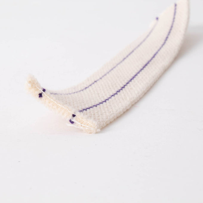 Close-up of a durable cotton lamp wick with two parallel purple stitching lines, designed for French oil lamps, featured in Lamps & Lighting, Parts and Accessories, Wicks and Mantles, Best Sellers, and Promo Eligible collections.