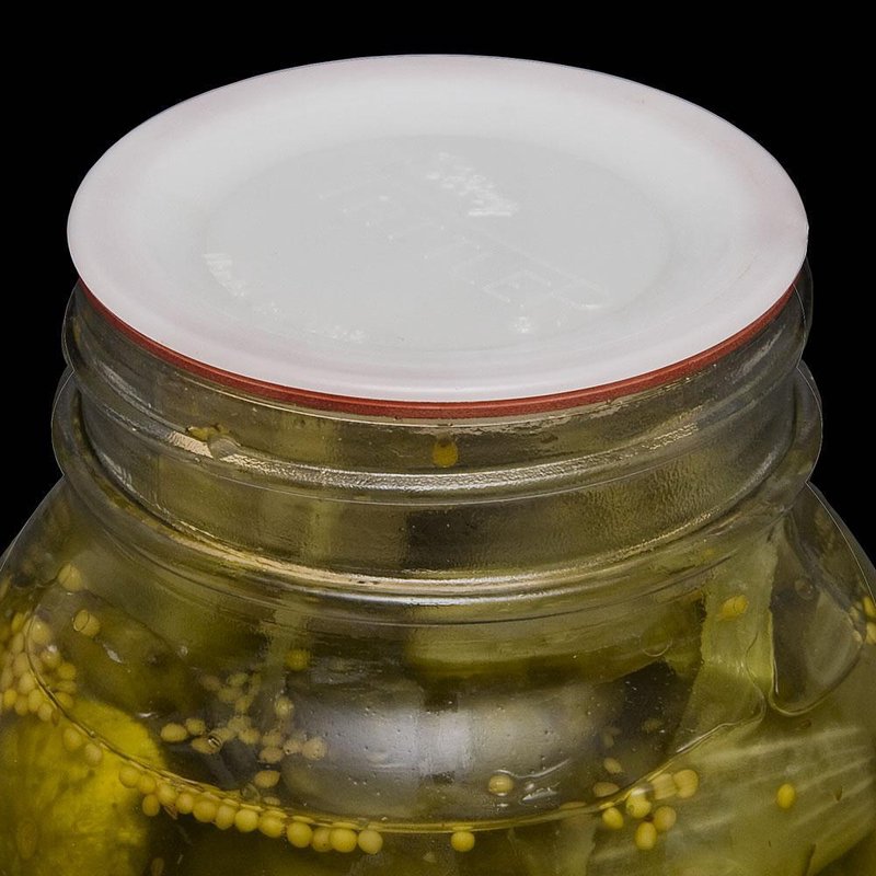 Wide-mouth canning jar topped with a reusable white plastic lid and orange sealing ring, ideal for Kitchen & Food, Food Preservation, Canning, USA Made, and Best Sellers collections.