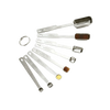 Set of eight stainless steel measuring spoons with deep elongated bowls, including smidgen, pinch, and dash sizes, designed for precise kitchen measuring in baking and food prep collections.