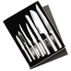 Set of seven handcrafted stainless steel knives and a vegetable peeler arranged neatly in a gift box, designed for food prep with sharp blades, made in USA, featured in Kitchen & Food and USA Made collections.