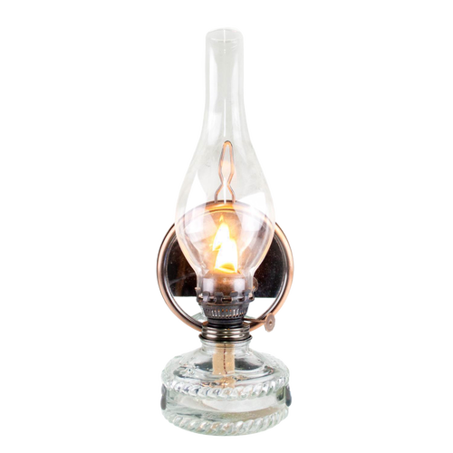 Reflector oil lamp with a clear glass base for fuel visibility, removable mirror reflector with copper finish, and tall glass chimney, handcrafted for Lamps & Lighting, Oil Lamps, Wall Lamps, and Best Sellers collections.