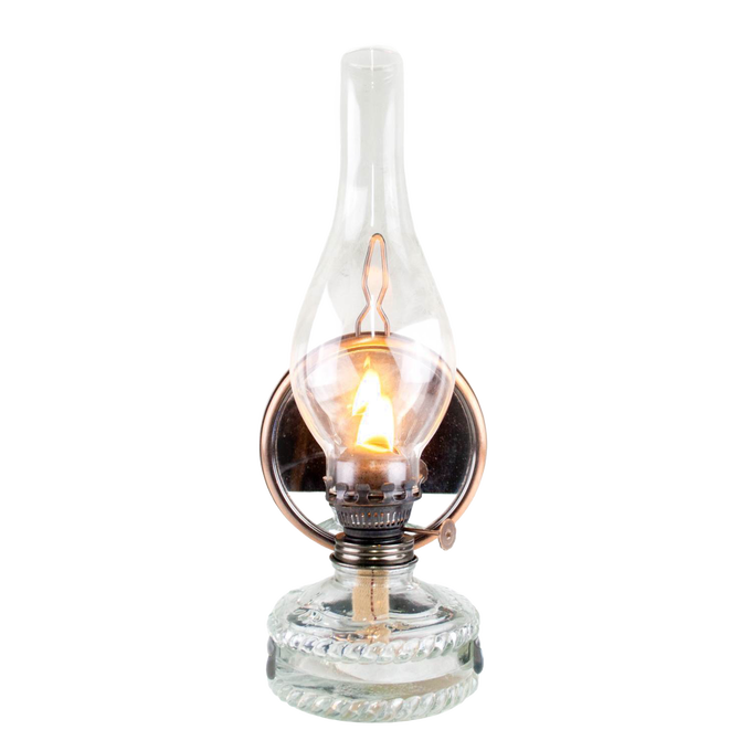 Reflector oil lamp with a clear glass base for fuel visibility, removable mirror reflector with copper finish, and tall glass chimney, handcrafted for Lamps & Lighting, Oil Lamps, Wall Lamps, and Best Sellers collections.