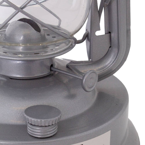 Close-up of a handcrafted metal lever and fuel cap on a silver lantern, showcasing durable construction for reliable lighting in farm, garden, camping, and emergency supplies.