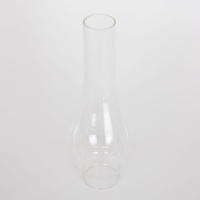 Handcrafted clear glass oil lamp chimney with a 2-inch base and tall rounded shape, designed for use with various lamps, featured in Lamps & Lighting, Parts and Accessories, Chimneys and Globes, Best Sellers, and Promo Eligible collections.