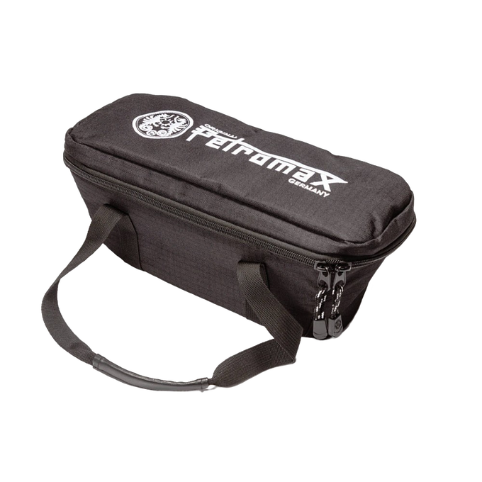 Compact black transport bag with sturdy handles and secure zipper closure, designed for safely storing and carrying a loaf pan, ideal for camping and farm, garden, and tool use.