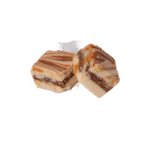 Two handcrafted creamy and caramel swirled fudge pieces with a layered texture, showcased on a decorative white doily, part of Kitchen & Food, Snacks and Sweets, USA Made, and Best Sellers collections.