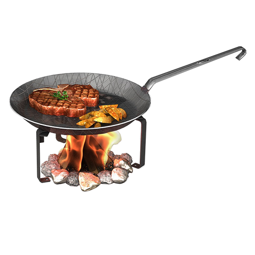Steel cooking stand supporting a frying pan over an open campfire with steak and seasoned potato wedges, perfect for outdoor use in Farm, Garden & Tool and Camping collections.