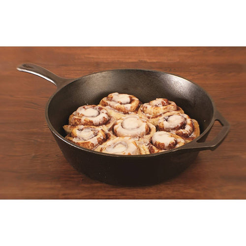Black cast iron deep skillet filled with freshly baked cinnamon rolls with icing, featuring an assist handle and long grip, ideal for Farm, Garden & Tool, Kitchen & Food, Camping, and Cookware collections.