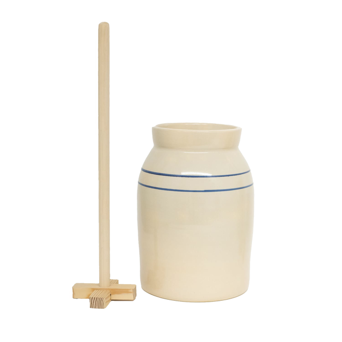 Handcrafted stoneware butter churn in natural stone color with traditional double blue stripes and smooth unfinished wooden dasher, made in USA, featured in Kitchen & Food and Specialty Equipment collections.