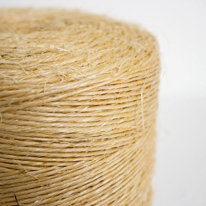 Close-up of natural beige sisal twine roll made from durable hemp fibers, featured in Farm, Garden & Tool, Garden Accessories, Best Sellers, and Promo Eligible collections.