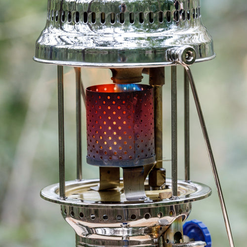 Close-up of a stainless steel radiator with perforated design glowing red from heat within a Petromax lamp, part of Lamps & Lighting, Parts and Accessories, Other Parts, and Best Sellers collections.