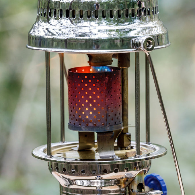 Close-up of a stainless steel radiator with perforated design glowing red from heat within a Petromax lamp, part of Lamps & Lighting, Parts and Accessories, Other Parts, and Best Sellers collections.