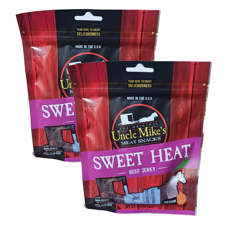 Two packets of handcrafted USA-made beef jerky snacks with sweet and spicy flavor, featured in Kitchen & Food, Snacks and Sweets, Meats, and Best Sellers collections.