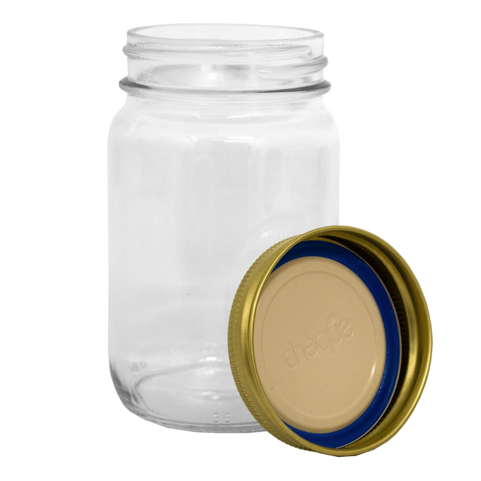 Clear regular-mouth glass canning jar alongside a durable metal lid with blue sealing ring, designed for food preservation in Kitchen & Food, Canning, and USA Made collections.