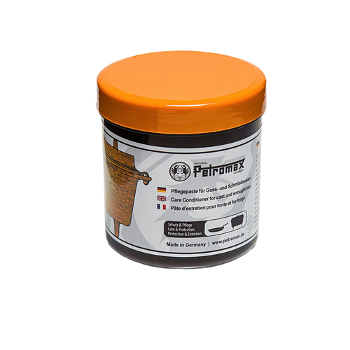 Container of petromax care conditioner with orange lid, crafted to maintain and protect cast and wrought iron cookware, ideal for Kitchen & Food, Cookware, Cast Iron, and Best Sellers collections.