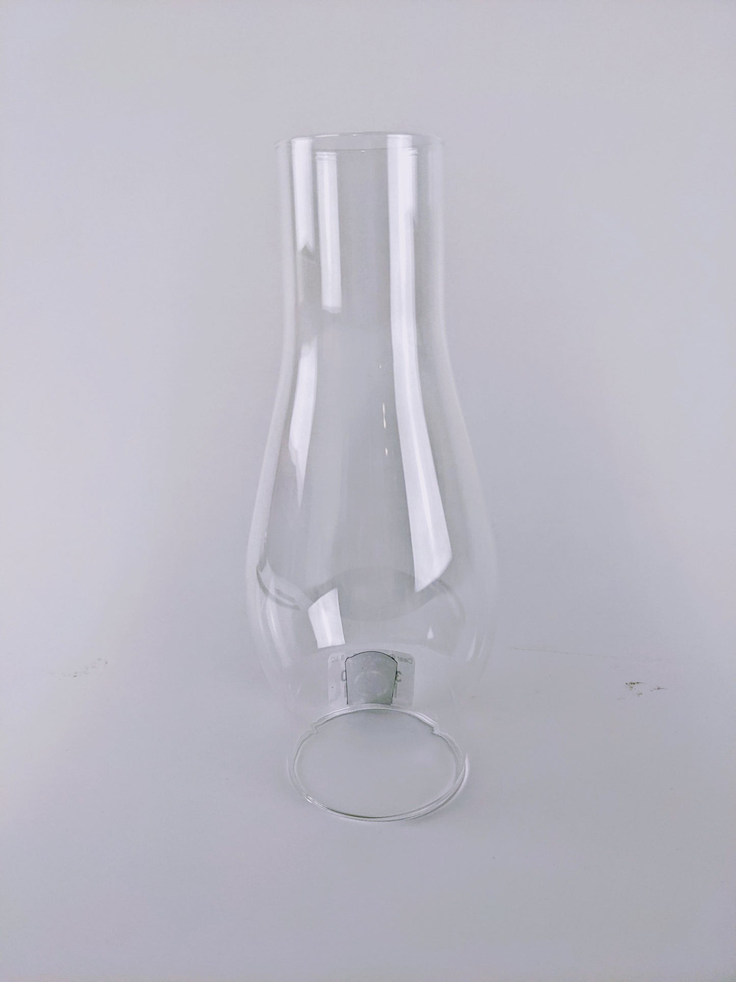 Clear handcrafted glass chimney with 2-5/8" base diameter, designed for oil lamps, part of Lamps & Lighting, Parts and Accessories, Chimneys and Globes, Best Sellers, and Promo Eligible collections.