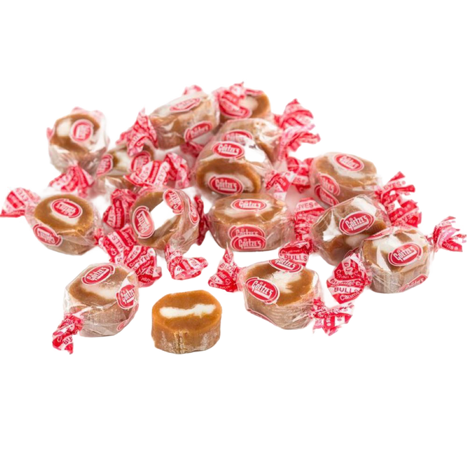 Individually wrapped creamy caramel sweets with a soft white center, handmade in the USA, perfect for Kitchen & Food, Snacks and Sweets, and Best Sellers collections.