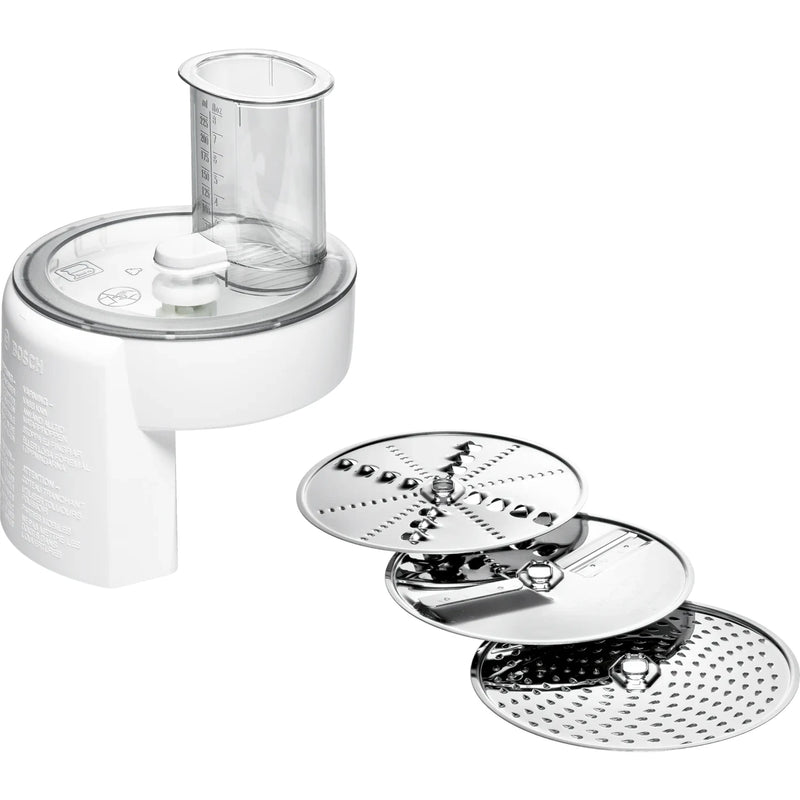 White plastic slicer shredder attachment with clear feed chute, accompanied by three stainless steel discs for slicing, shredding, and grating, ideal for Kitchen & Food and USA Made collections.