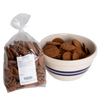 Two bags of handcrafted crispy ginger snap cookies, rich in warm spices and molasses, displayed beside a ceramic bowl with blue stripes, part of Kitchen & Food and USA Made collections.