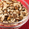 Clear glass bowl filled with shelled black walnuts, showcasing their rich, natural texture, ideal for baking and snacking, featured in Kitchen & Food, Snacks and Sweets, and USA Made collections.