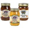 Three glass jars of handcrafted unique flavored butters including pecan pumpkin, hot pepper, and sweet potato varieties, made in USA, ideal for Kitchen & Food, Pantry, and Best Sellers collections.