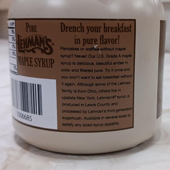 Handcrafted beige container of medium amber maple syrup with a brown vintage-style label, featured in Kitchen & Food, Pantry, USA Made, and Best Sellers collections.