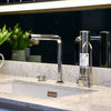 Polished stainless steel countertop water filter system with cylindrical body and curved tap, displayed on a marble surface, ideal for Appliances, Water Heating and Treatment, and Best Sellers collections.