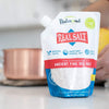 Stand-up pouch of ancient fine sea salt with unrefined minerals, featuring a resealable spout, ideal for Kitchen & Food, Pantry, USA Made, Best Sellers, and Promo Eligible collections.