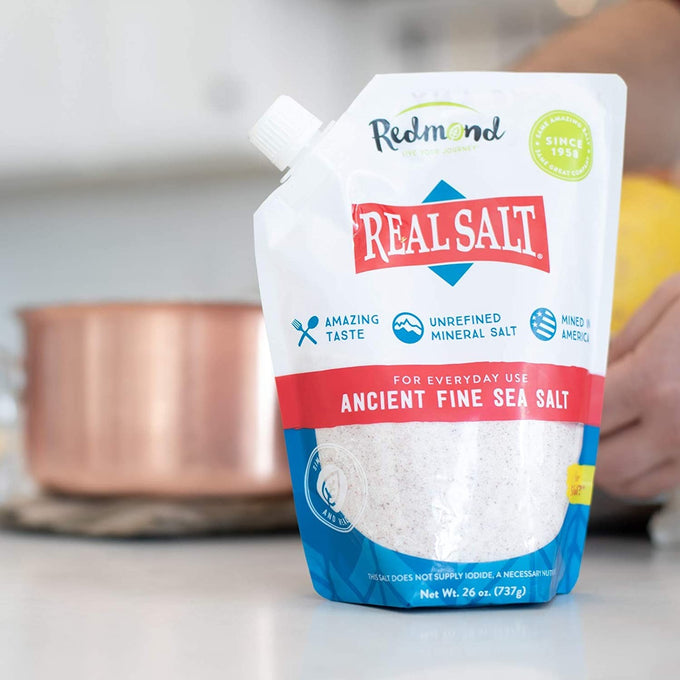Stand-up pouch of ancient fine sea salt with unrefined minerals, featuring a resealable spout, ideal for Kitchen & Food, Pantry, USA Made, Best Sellers, and Promo Eligible collections.