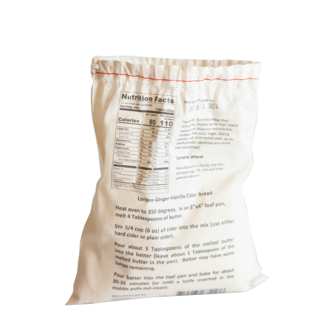 Natural fabric pouch showcasing handcrafted lemon-ginger-vanilla cider bread mix with detailed baking instructions and nutrition facts, ideal for Kitchen & Food, Pantry, Dry Goods and Mixes, Best Sellers, Promo Eligible collections.