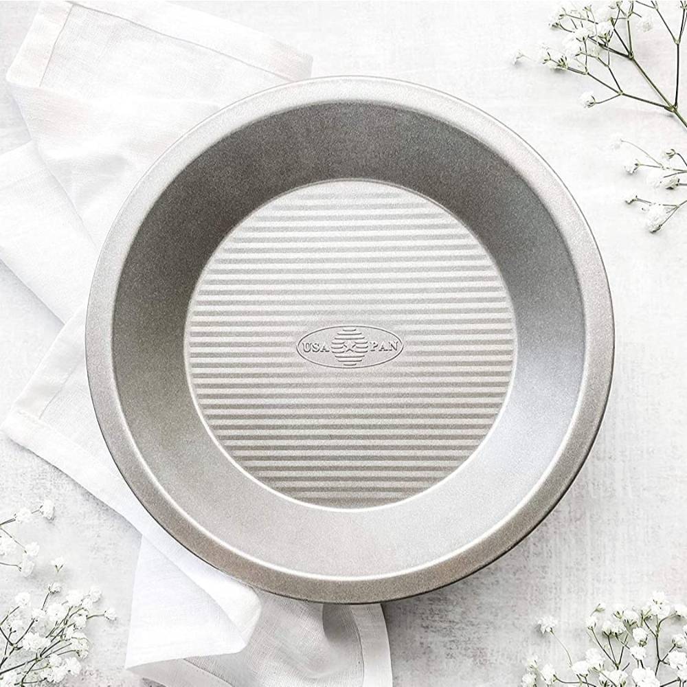 9-inch aluminized steel pie pan with fluted nonstick surface for even baking and quick release, made in USA, ideal for Kitchen & Food, Cookware, Baking Supplies, and Best Sellers collections.