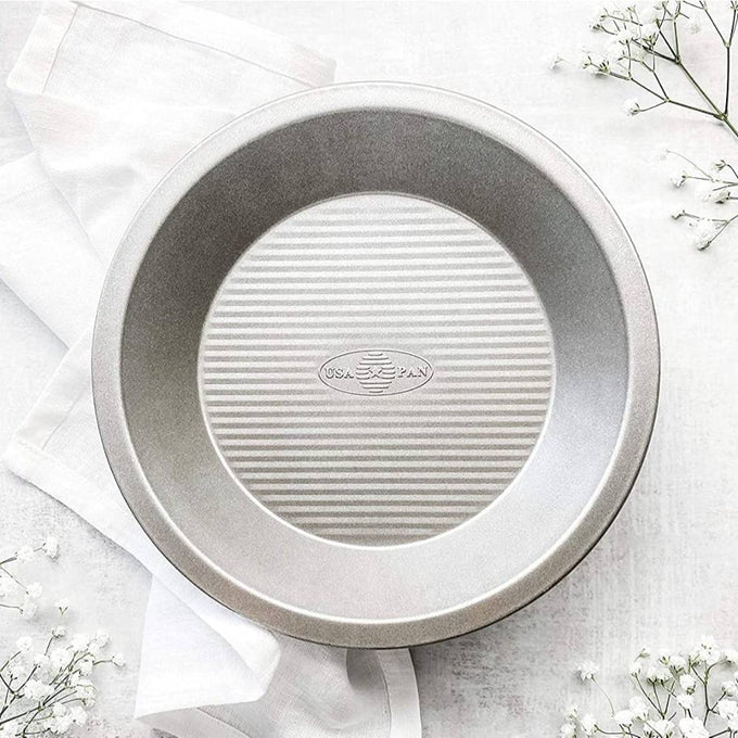 9-inch aluminized steel pie pan with fluted nonstick surface for even baking and quick release, made in USA, ideal for Kitchen & Food, Cookware, Baking Supplies, and Best Sellers collections.