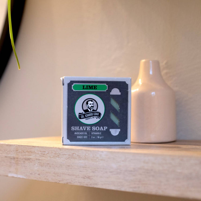 Small lime-scented shaving soap packaged in a box with branding featuring avocado oil and vitamin E, part of Health & Wellness, Grooming and Personal Hygiene, Soaps and Soapmaking, USA Made, Best Sellers, Promo Eligible collections.