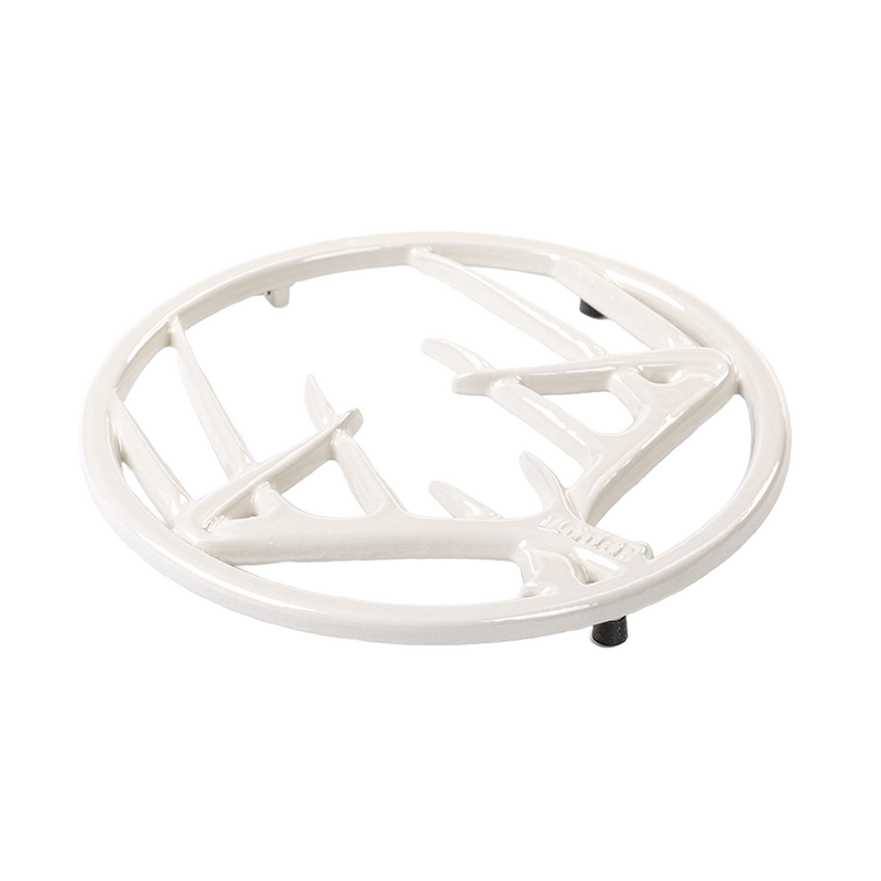 Round enamel trivet with antler-inspired design in off-white, featuring a chip-resistant finish, rubber feet for stability, and built-in hanger, ideal for Kitchen & Food, Dinnerware, Storage and Serving, Best Sellers, and Promo Eligible collections.