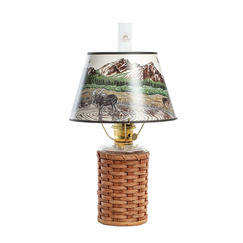 Handcrafted Amish-made wicker oil lamp base paired with a parchment shade featuring a detailed Rocky Mountain wildlife scene, ideal for Lamps & Lighting and Emergency Supplies collections.