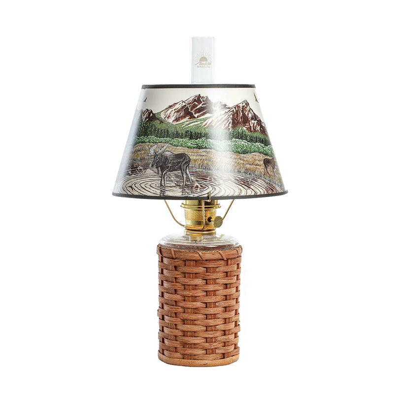 Handcrafted Amish-made wicker oil lamp base paired with a parchment shade featuring a detailed Rocky Mountain wildlife scene, ideal for Lamps & Lighting and Emergency Supplies collections.