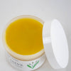 Open jar of handcrafted Amish made all-natural plantain salve with smooth yellow ointment, featured in Health & Wellness, Health Remedies, USA Made, and Best Sellers collections.