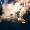 Clear replacement glass knob atop a steaming metal percolator lid, designed for Kitchen & Food, Brewing Coffee and Tea, Best Sellers, and Promo Eligible collections, showcasing craftsmanship.