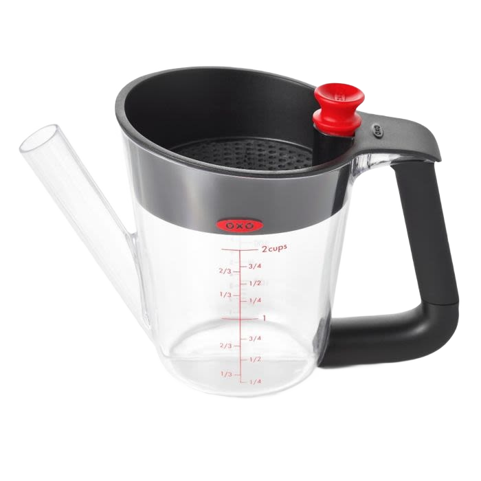 Clear fat separator with black soft-grip handle, red stopper, measurement markings, and built-in strainer, designed for Kitchen & Food, Cooking Helpers, and Promo Eligible collections.