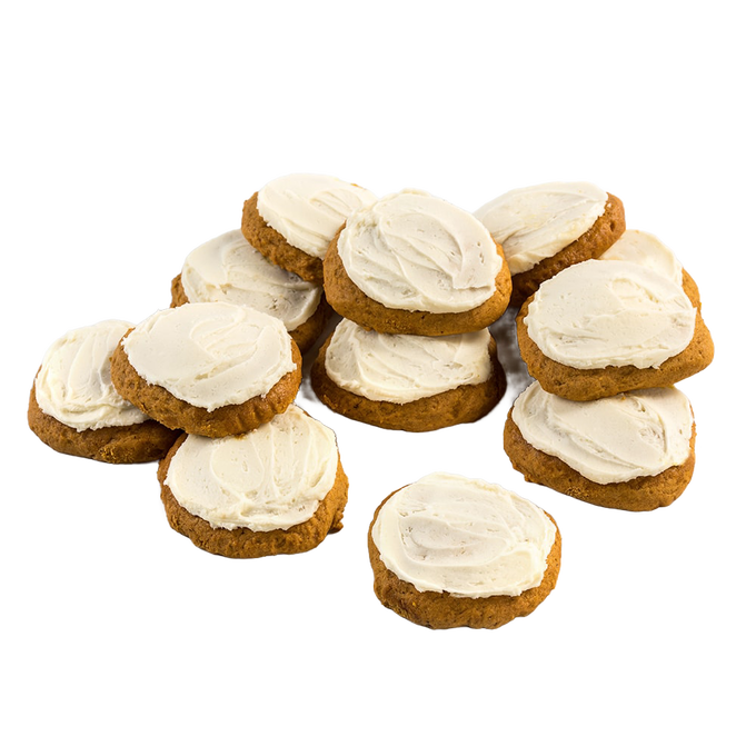 Stack of moist, iced pumpkin cookies with creamy white frosting, showcasing a handcrafted Amish-made treat from USA’s Ohio Amish Country, fitting Kitchen & Food and Snacks collections.