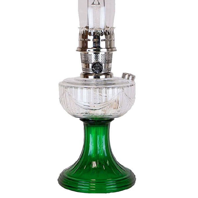 Clear glass oil lamp bowl over a handcrafted emerald glass base with a sweeping font design, featuring metal burner components, perfect for Lamps & Lighting, Oil Lamps, and Table Lamps collections.